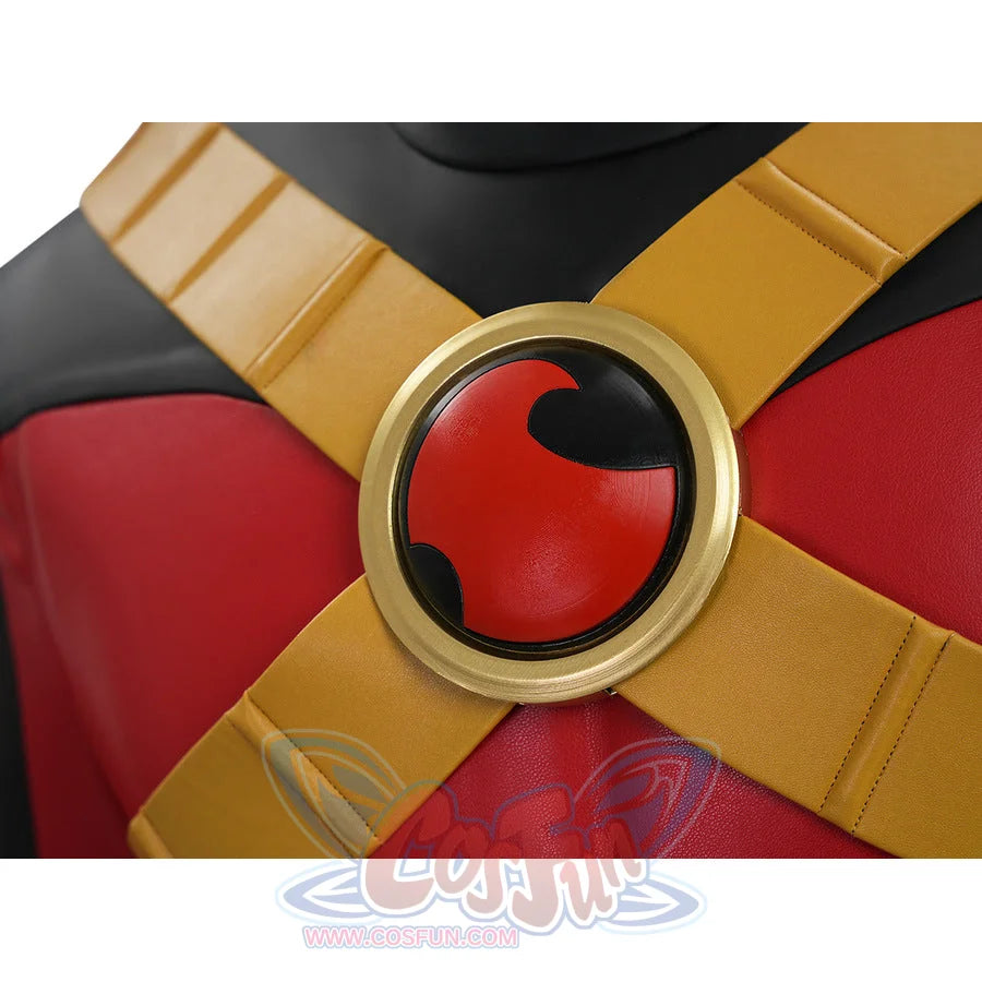 Tim cosplay costume chest emblem closeup showing gold ring and red symbol on crossed straps