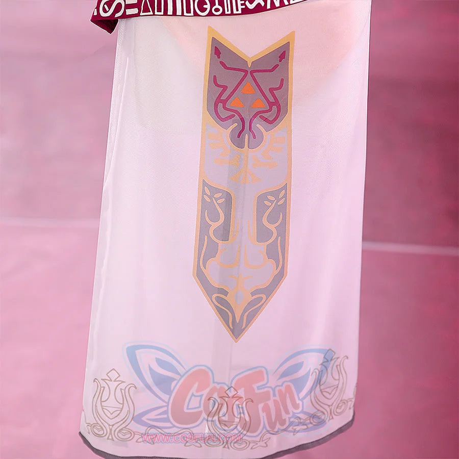 Close-up of the Princess Zelda cosplay sheer skirt featuring an ornate Zelda crest print in pink and purple with scrollwork hem detail.