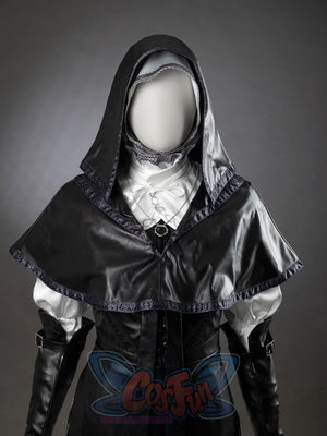 Undertaker cosplay nun costume close-up showing black hooded capelet with silver trim, ornate white blouse, black belt