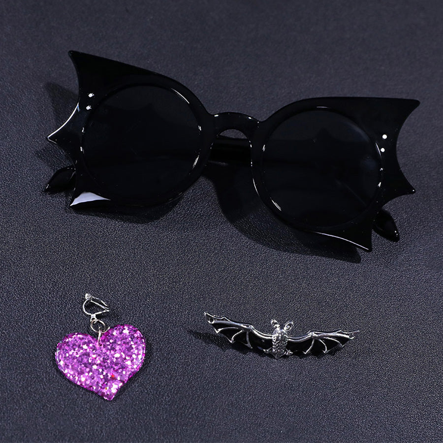 Vampire Vee Cosplay Costume accessories including black bat hair clip, purple glitter heart pin, and silver bat  lapel pin