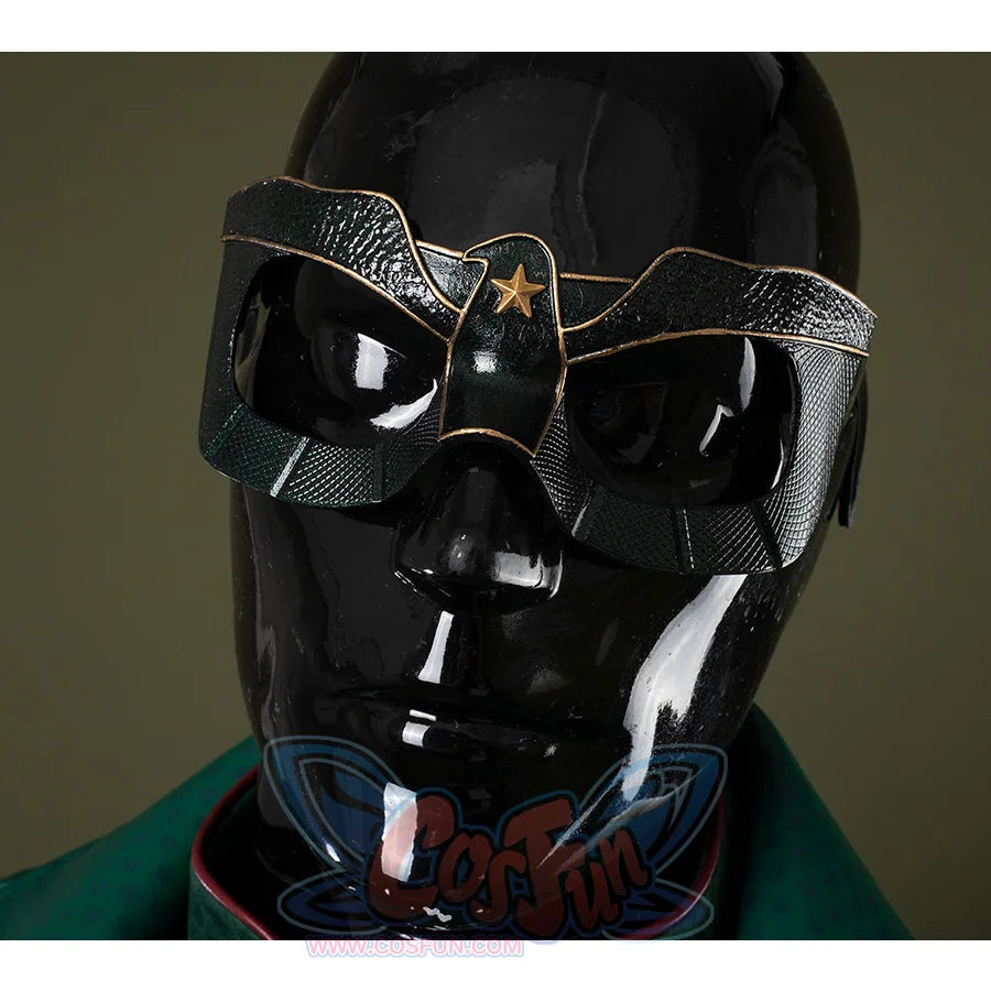 The mask is entirely black, adorned with golden bird-like lines and a star motif in the center.