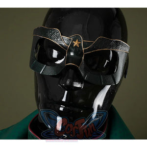 The mask is entirely black, adorned with golden bird-like lines and a star motif in the center.