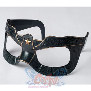 The mask is entirely black, adorned with golden bird-like lines and a star motif in the center.