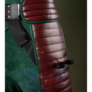 Pants mainly in dark green, accented with gold and reddish-brown tones, black rings on the sides for holding items.