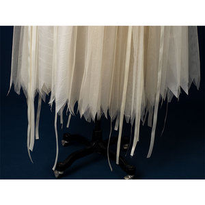 Enid Sinclair Gala dress skirt hem close-up with layered cream tulle, irregular edges, flowing ballet-style underskirt