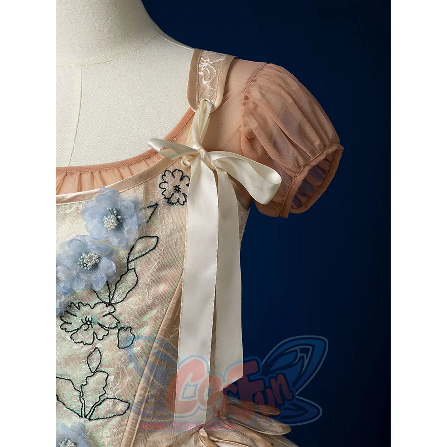 Enid Sinclair Gala dress vest strap detail with embroidered ribbon, puff sleeve, cream tie, floral embroidery pattern