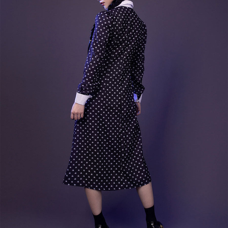 Wednesday cosplay navy dress with white collar, full-length front view, arms crossed