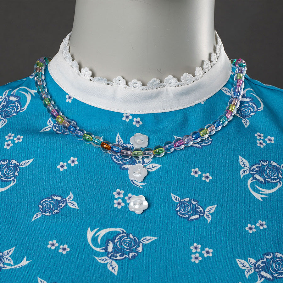 Wheeler cosplay costume neckline with white lace collar, colorful beaded necklace, blue floral bodice
