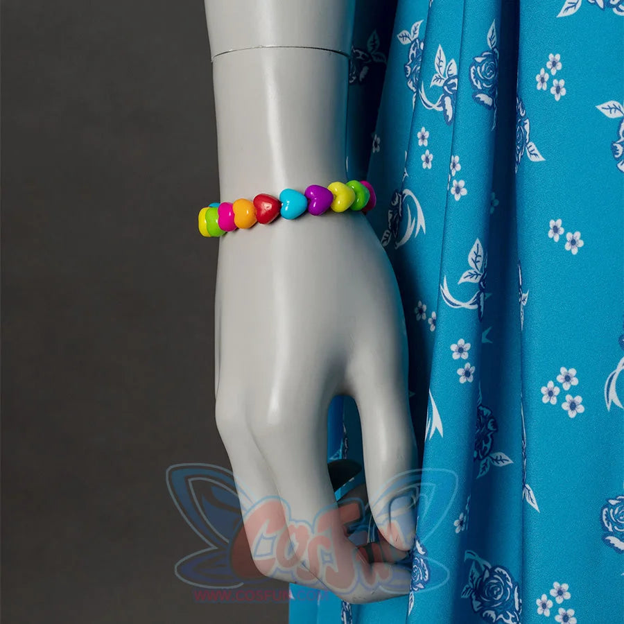 Wheeler cosplay costume accessory detail with colorful beaded bracelet and blue floral dress