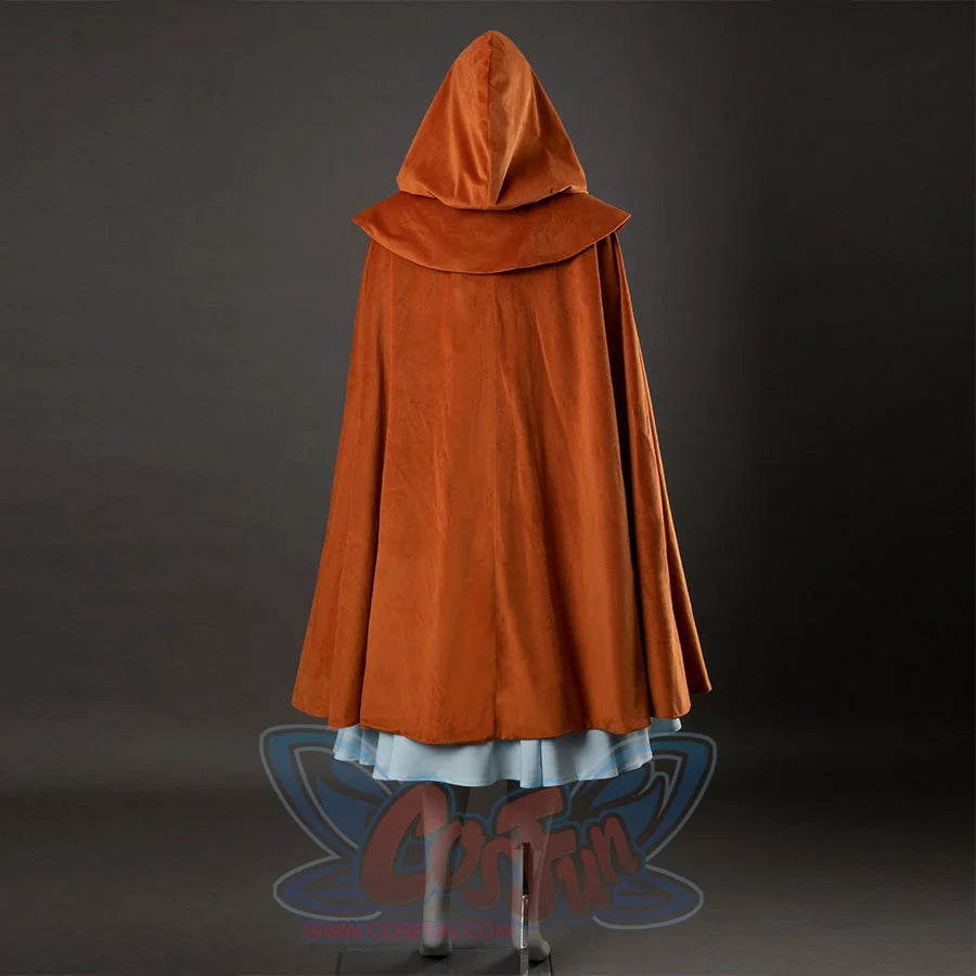 Holly cosplay costume with yellow-brown hooded cloak, blue floral dress, and light blue hem details