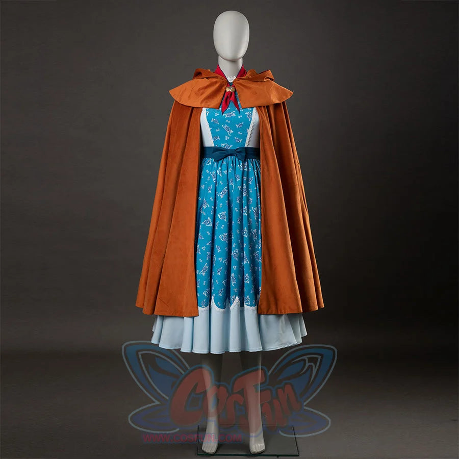 Holly cosplay front view without hood, showing yellow-brown cape, blue floral dress, and light blue hem