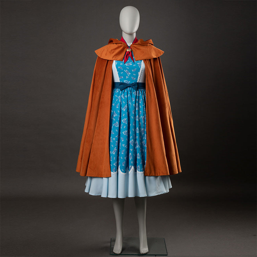 Holly cosplay front view without hood, showing yellow-brown cape, blue floral dress, and light blue hem