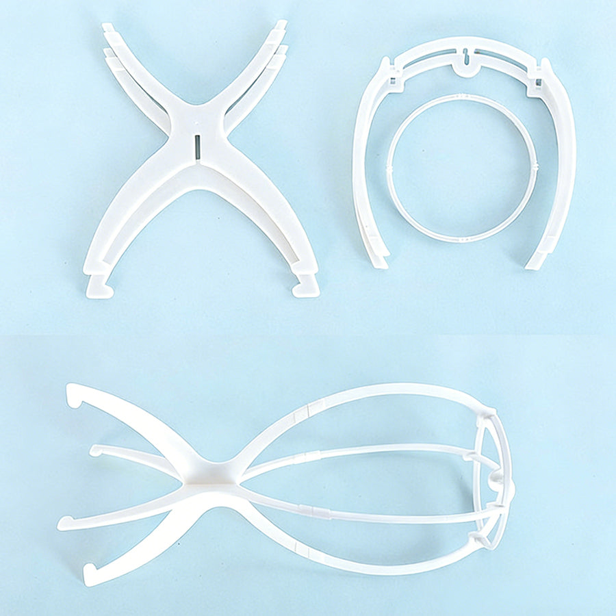 White detachable wig stand parts laid flat showing disassembled components