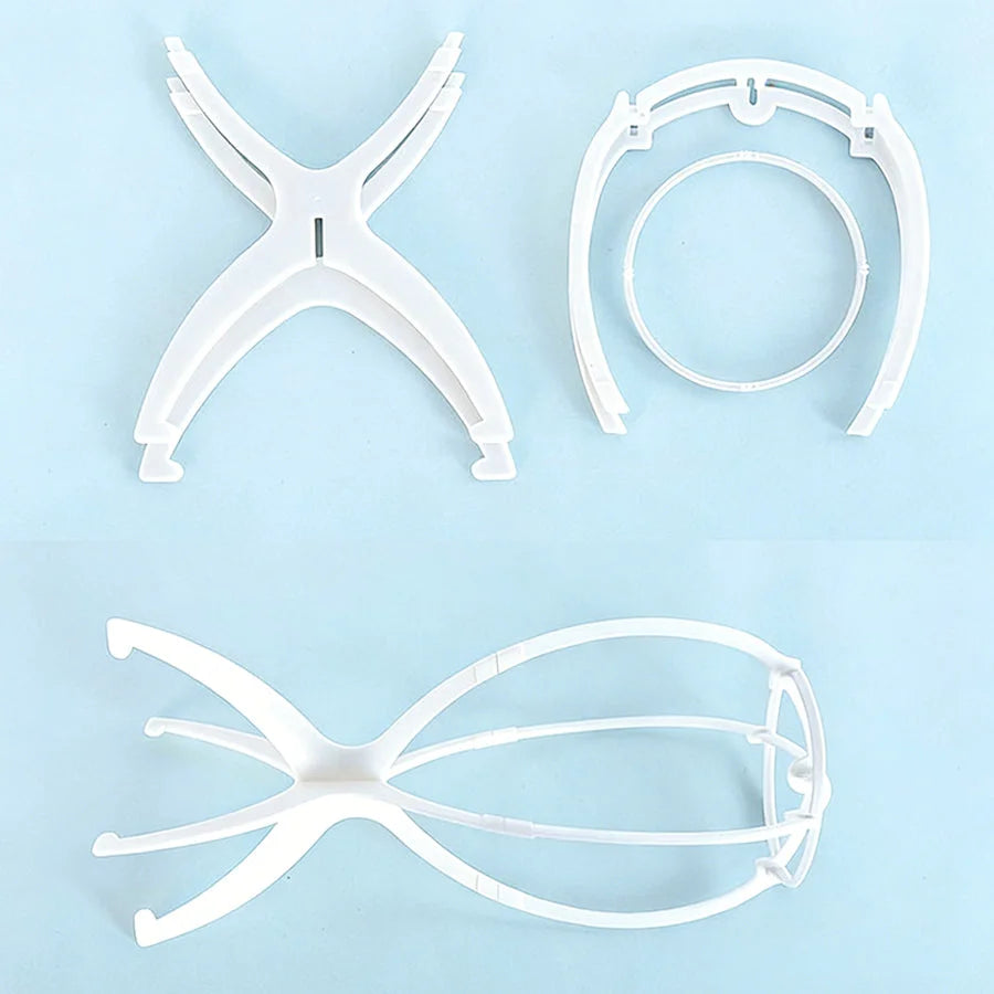 White detachable wig stand parts laid flat showing disassembled components