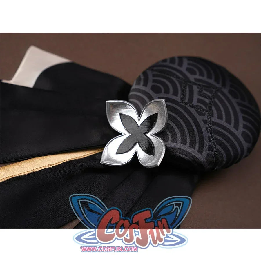 The center part of the headband is a complex pattern with silver flower decorations below.