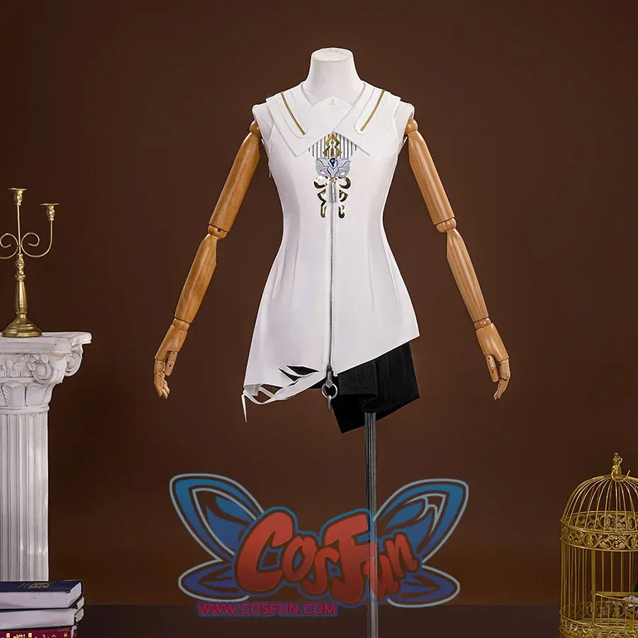 The lining is white and long with black pinstripes below the collar and a complex pattern in the middle of the shirt, the hem is irregular and torn, matching side skirt.