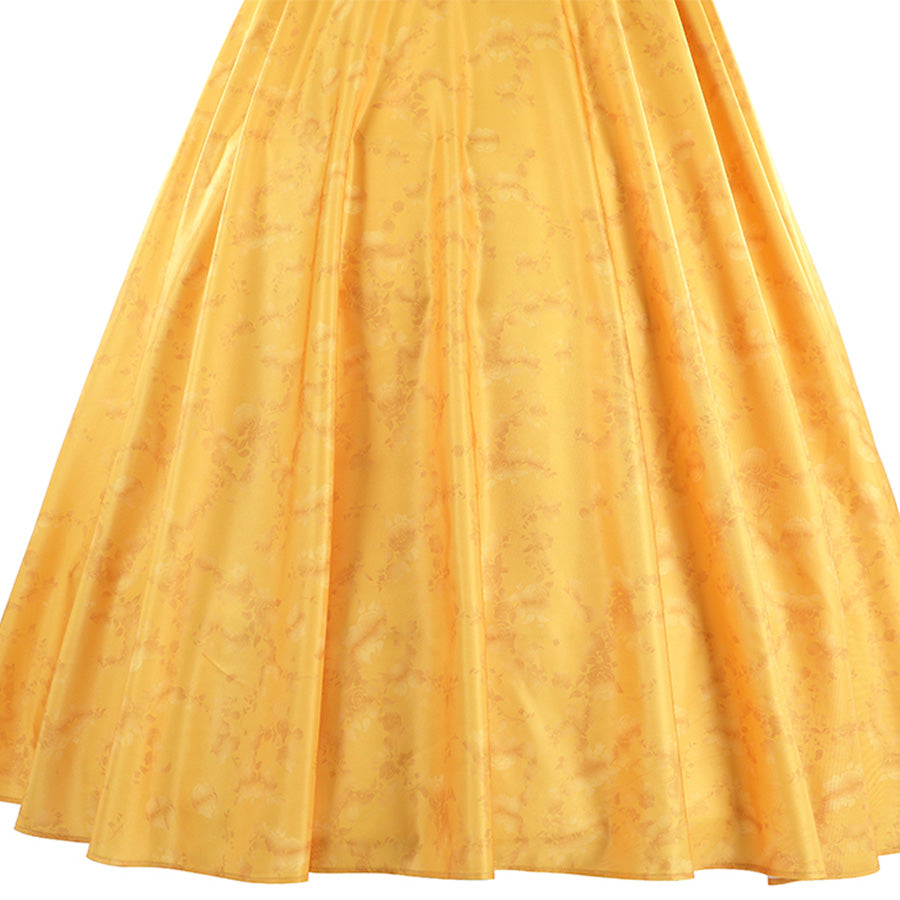 Judy yellow floral dress pleated skirt hem detail showing fabric texture and flow