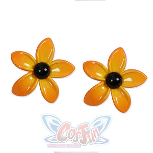  Two flowers accessorie on the shoulder straps, with orange petals, black stamens.