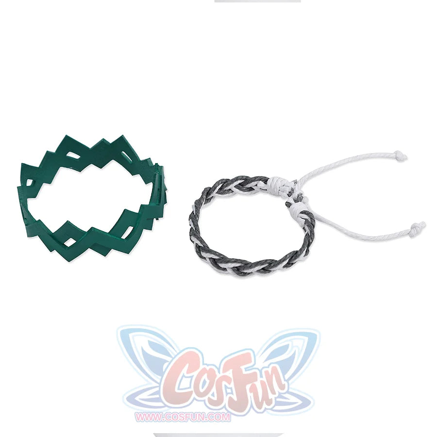 There are a green geometric bracelet with an irregular angular design, and a bracelet woven from black and white ropes.