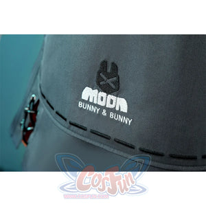 Zhao cosplay costume apron detail showing embroidered Moon Bunny & Bunny logo and decorative stitching on gray fabric