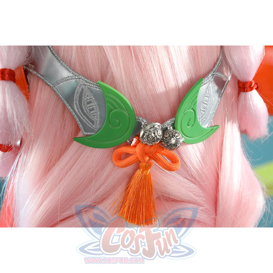 Zhao cosplay costume back headpiece showing green leaf decorations, silver chain, orange tassel, and silver flower centerpiece on pink wig