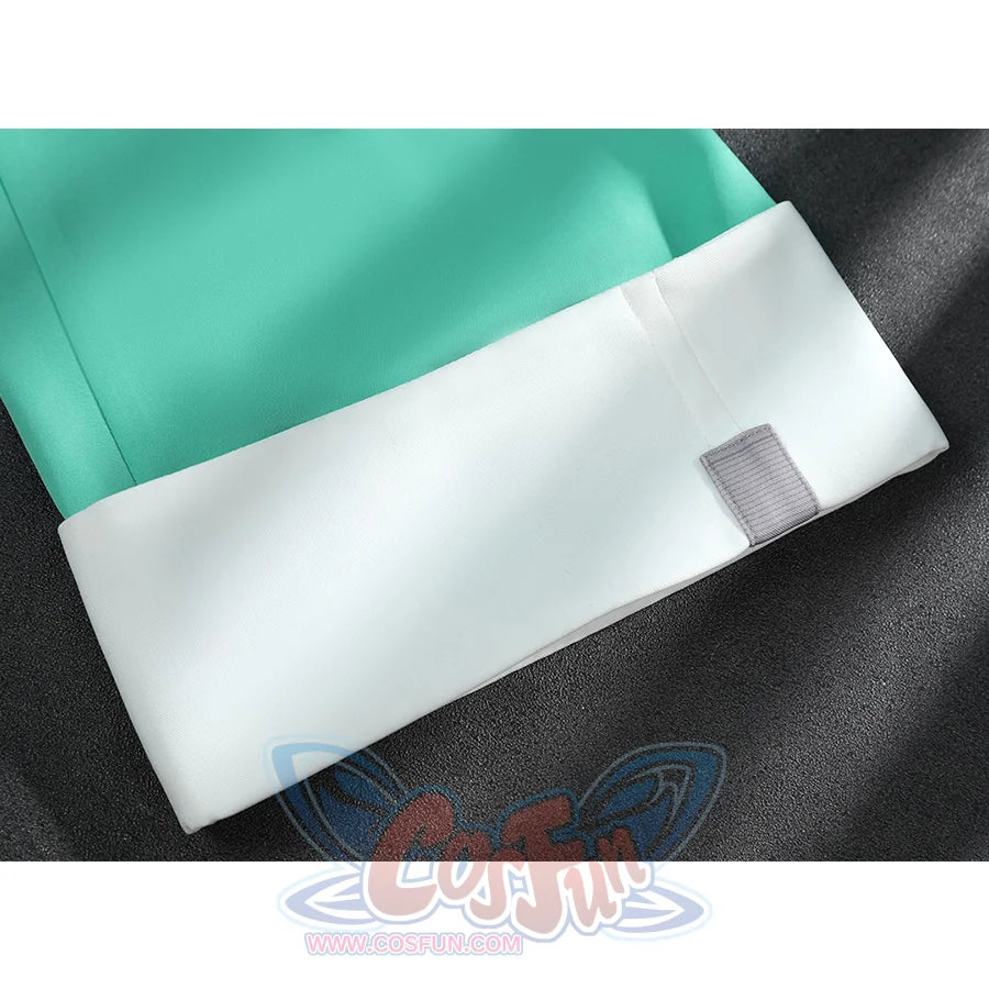 Zhao cosplay costume white cuff detail showing fabric texture with gray label patch on teal green sleeve