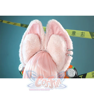 Zhao cosplay costume bunny ears close-up showing pink fluffy texture, silver rings, and braided pink wig with circular earphones