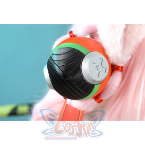 Zhao cosplay costume circular earphone accessory showing black ribbed speaker with silver star emblem, orange and green rings