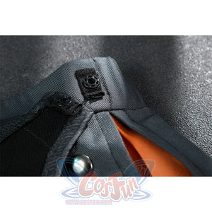 Zhao cosplay costume skirt button close-up showing black square snap fastener with silver stud on gray fabric and orange lining
