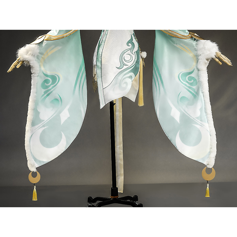 Zibai cosplay costume dress hem with teal swirl patterns, white fur trim, and gold tassel ornaments