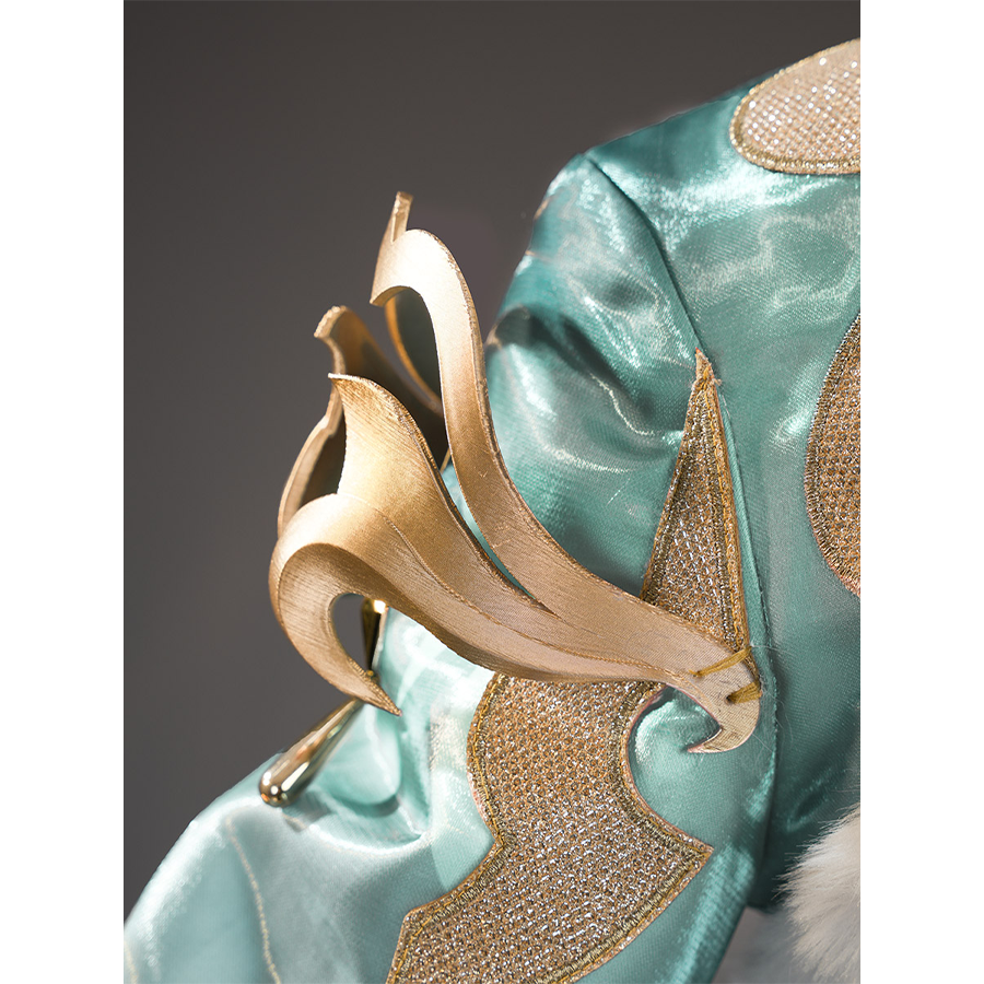 Zibai cosplay costume shoulder ornament with gold swirl design on teal fabric