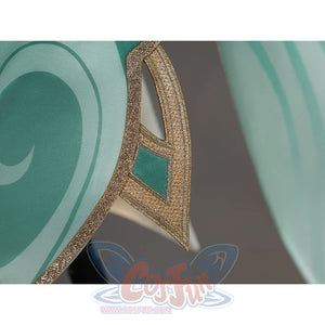 Zibai cosplay costume hem trim close-up with intricate gold embroidered pattern on teal