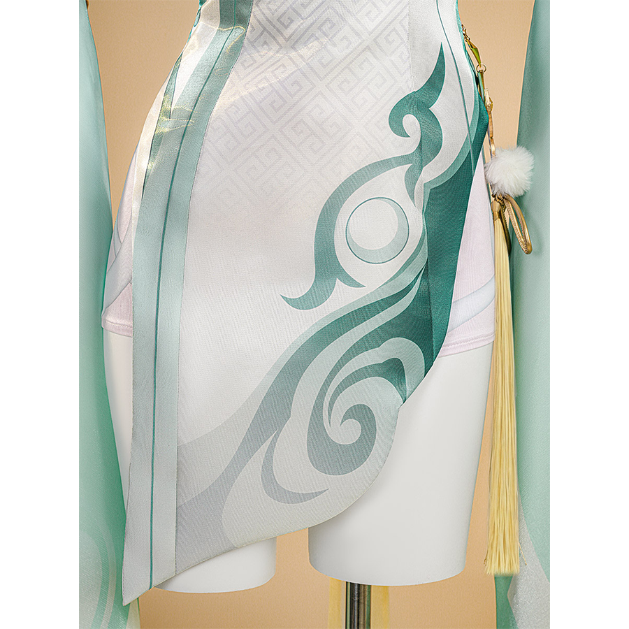 Zibai cosplay costume dress hem detail with turquoise swirl patterns and cream-colored tassel accent