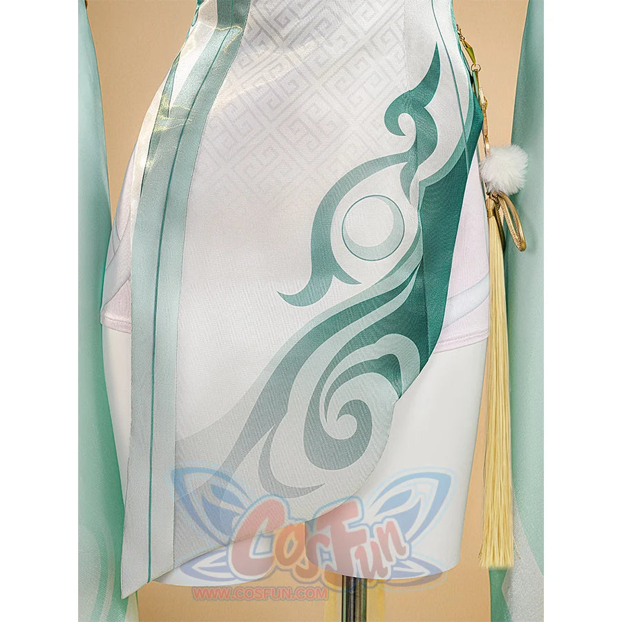 Zibai cosplay costume dress hem detail with turquoise swirl patterns and cream-colored tassel accent