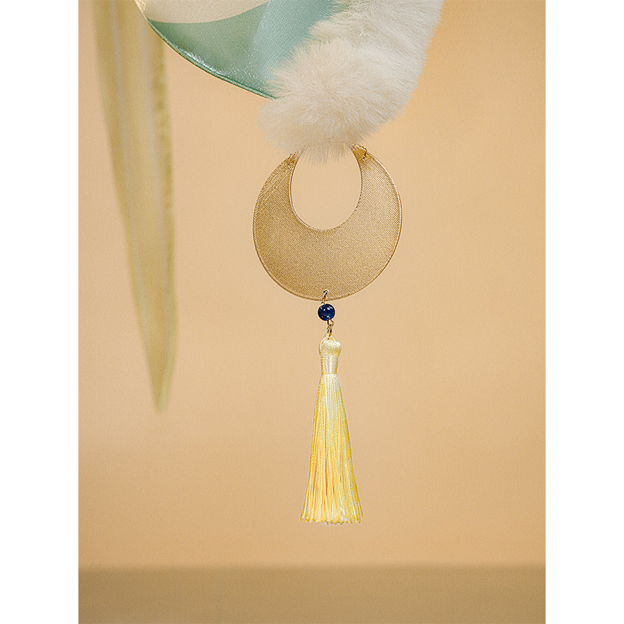 Zibai cosplay costume sleeve pendant featuring gold crescent with blue gem and cream-colored tassel