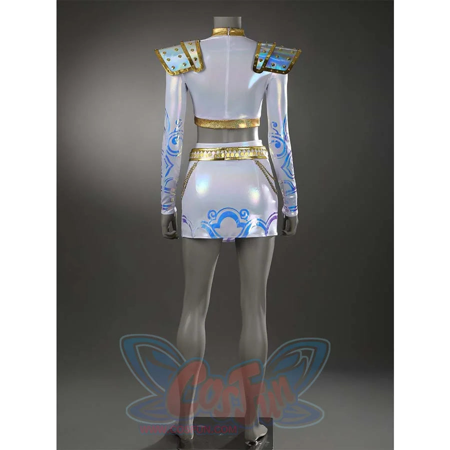 Reveals the back of Zoey’s outfit, featuring blue patterns on the skirt, gold trims, and the iridescent sheen of the entire ensemble.