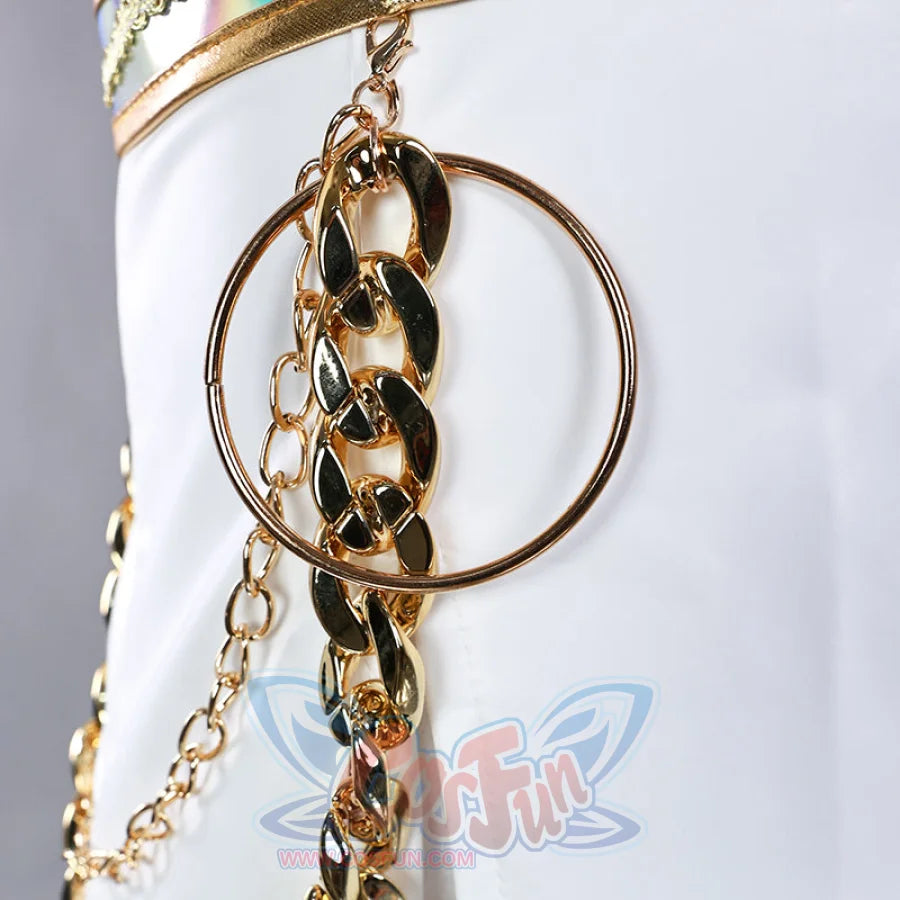 Offers an extreme close - up of the gold chains and rings on Zoey’s skirt, showcasing the detailed and shiny metal accents.