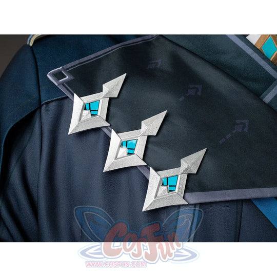 Aether cosplay chest ornament close-up with three silver-tone pieces and turquoise square centers.