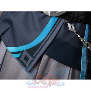 Aether cosplay coat hem detail layers dark teal panels with turquoise trim around a geometric motif.