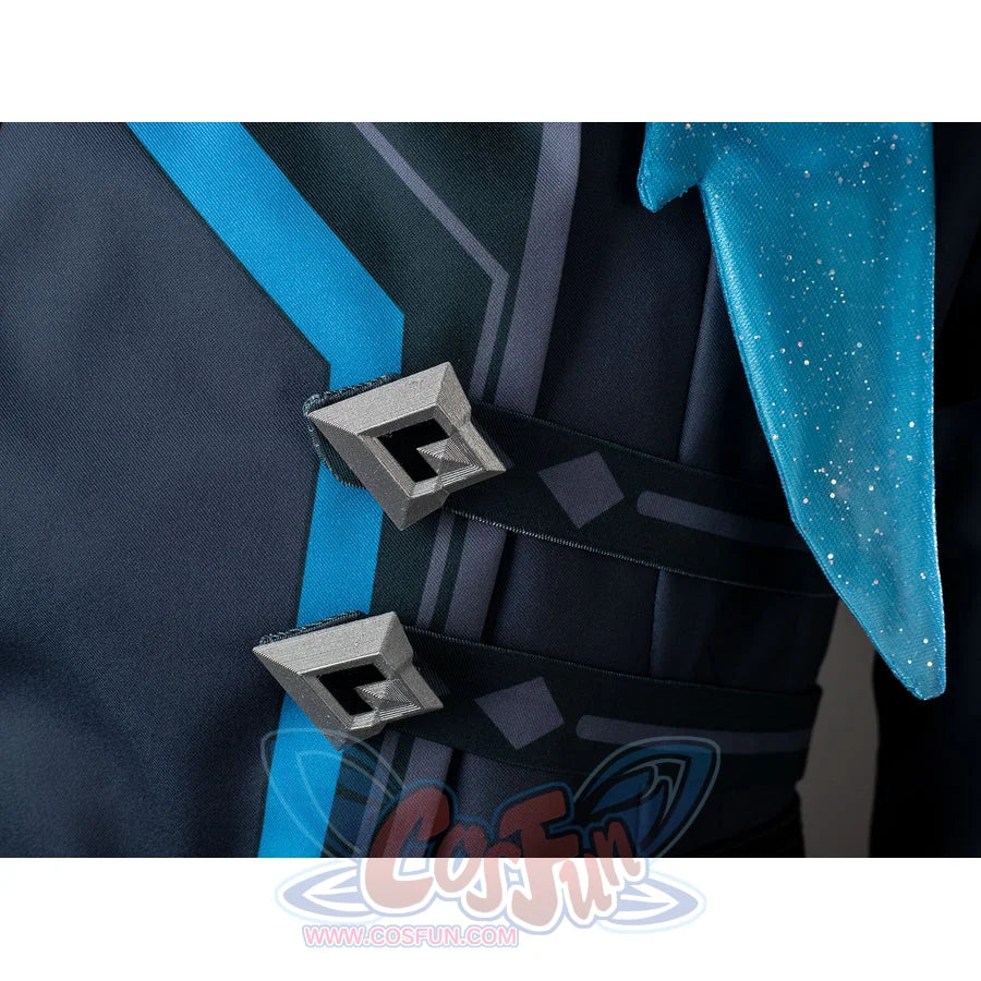 Aether cosplay coat detail shows black side straps and square buckles beside turquoise-edged panels.