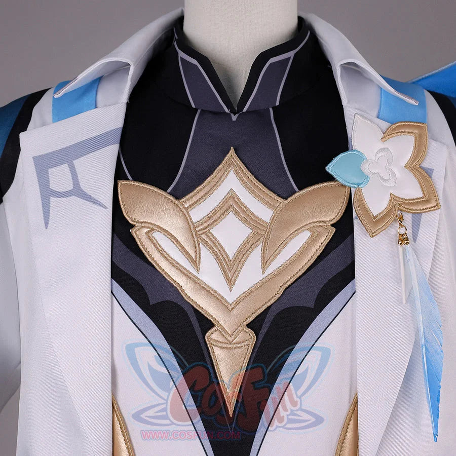 Chest detail of Genshin Impact Aether cosplay costume with black inner top, gold emblem, white lapels, and blue shoulder trim