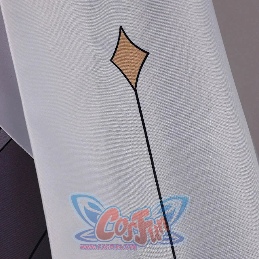 Close-up of Genshin Impact Aether cosplay costume sleeve with white fabric, gold diamond motif, and black line detail