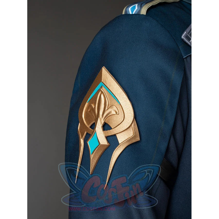 Aether cosplay sleeve ornament close-up with a gold-tone pointed design on dark teal fabric.