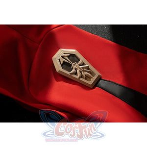 Genshin Impact Amber cosplay armband accessory detail sets a gold-tone emblem over red fabric.