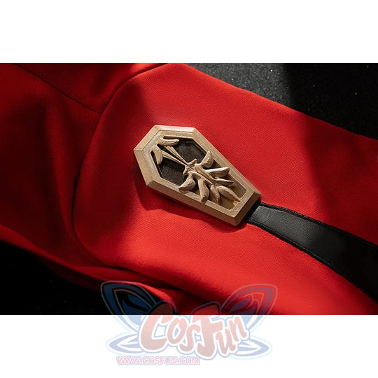 Genshin Impact Amber cosplay armband accessory detail sets a gold-tone emblem over red fabric.
