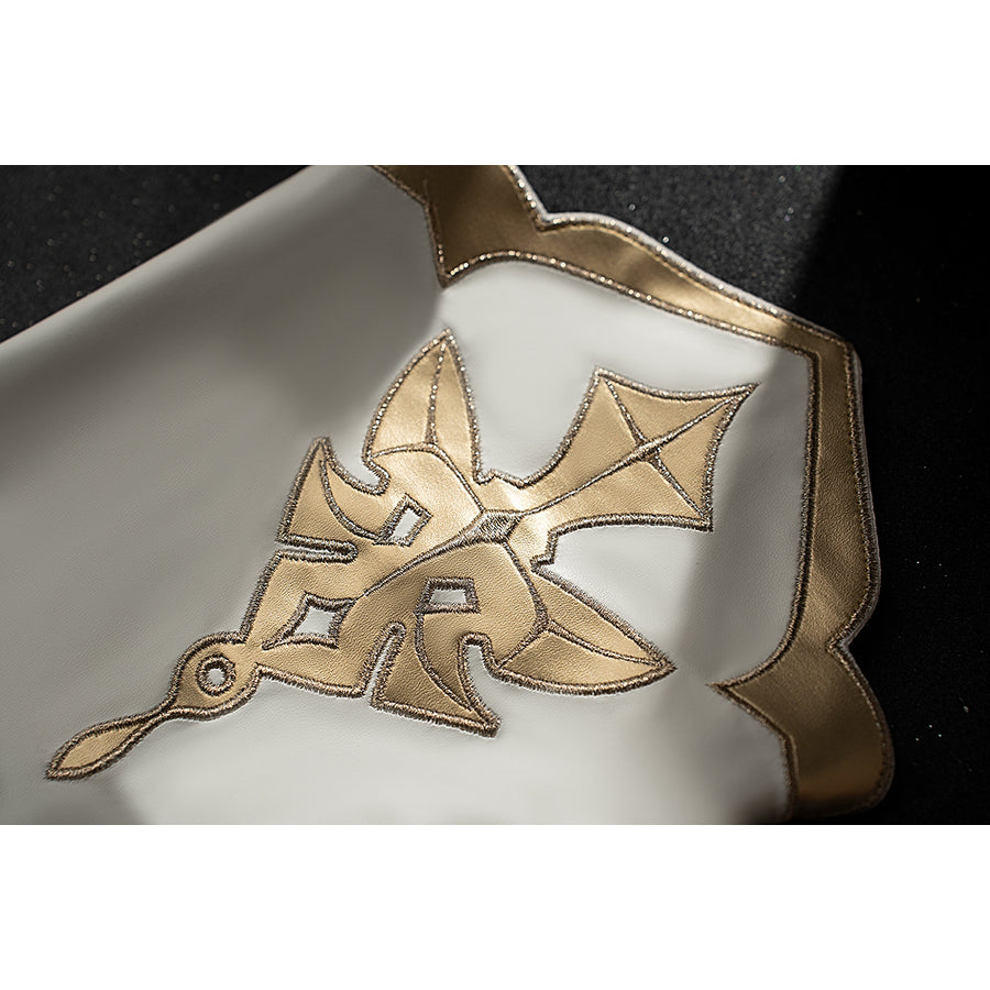 Genshin Impact Amber cosplay bodysuit chest detail centers gold embroidery over the white neckline.