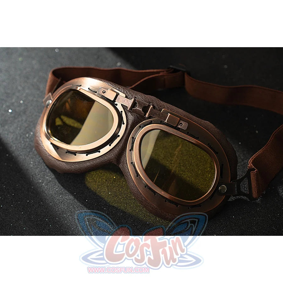 Genshin Impact Amber cosplay goggles close-up shows brown straps and translucent yellow lenses.