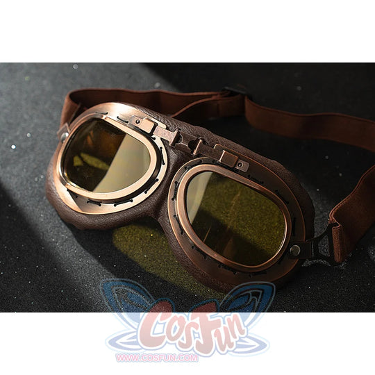 Genshin Impact Amber cosplay goggles close-up shows brown straps and translucent yellow lenses.