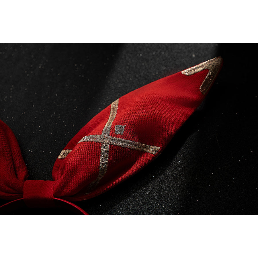 Genshin Impact Amber cosplay headband ear detail shows red fabric stitching and gold-tone edge accents.