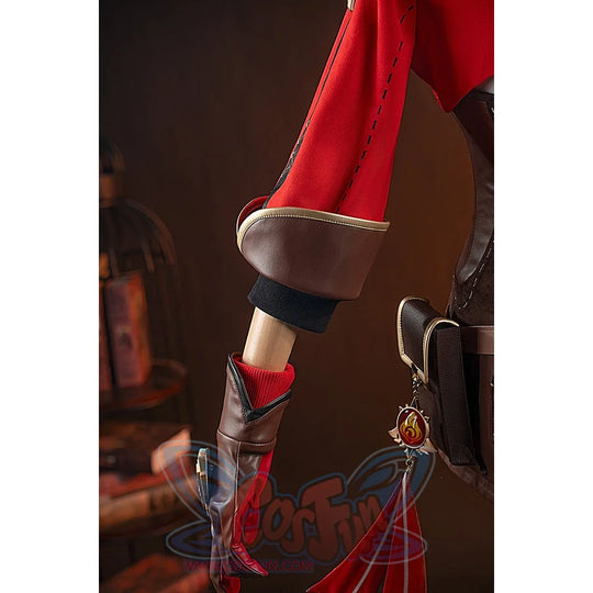 Genshin Impact Amber cosplay vision side accessory hangs from the red coat beside the brown cuff.
